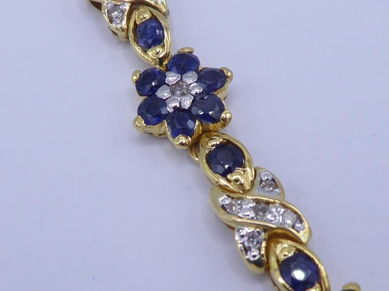 A sapphire and diamond necklace, composed of alternate daisy clusters of sapphires and pave set - Image 3 of 5