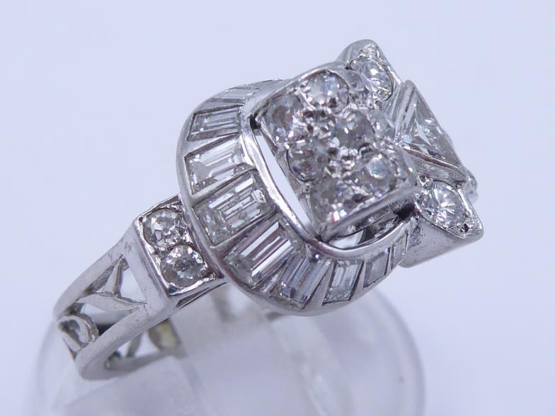 A mid 20th century diamond dress ring, the ornate buckle design set overall with single cuts and - Image 4 of 4