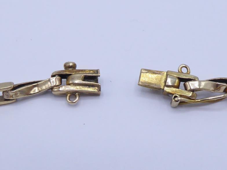 A 1940s citrine set yellow metal (tests 9 carat gold) bracelet, the central collet set oval cut - Image 2 of 3