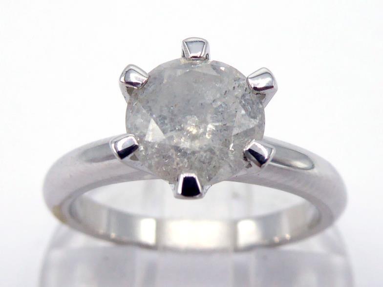 A single stone diamond ring, the central brilliant approx. 1.41 carat, the 18 carat white gold shank