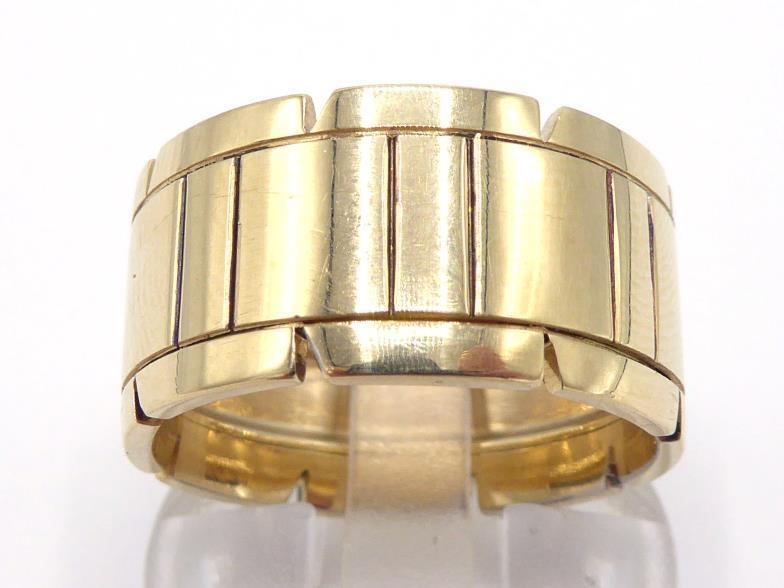 CARTIER, an 18 carat yellow gold 'Tank' ring, the inner shank signed and numbered CM5204, finger