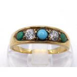 A Victorian turquoise and diamond ring, set with two old cut brilliants, small turquoise cabochons