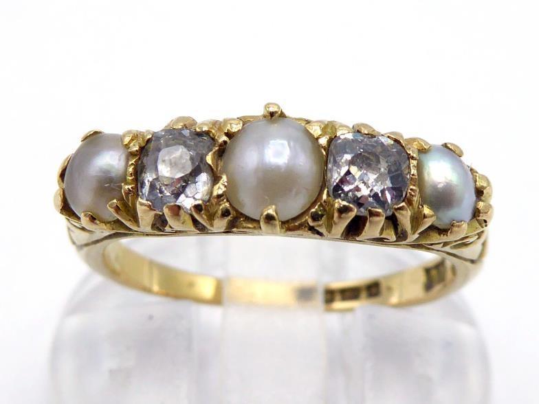 A Victorian split pearl and diamond half hoop ring, set with alternate split pearls and mine cut