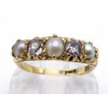 A Victorian split pearl and diamond half hoop ring, set with alternate split pearls and mine cut