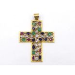 A gem set pendant cross, the openwork scrolling trellis design set overall with pear cut sapphires