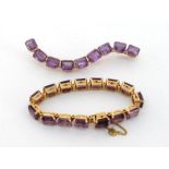 An amethyst line bracelet, set along its length with 10 x 8mm emerald cut amethysts, to a