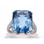 An Art Deco aquamarine and diamond ring by Tiffany & Co., the rectangular mixed cut approx. 5.74