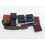 A collection of jewellery boxes including a red Must de Cartier watch box stamped C0590 and grey