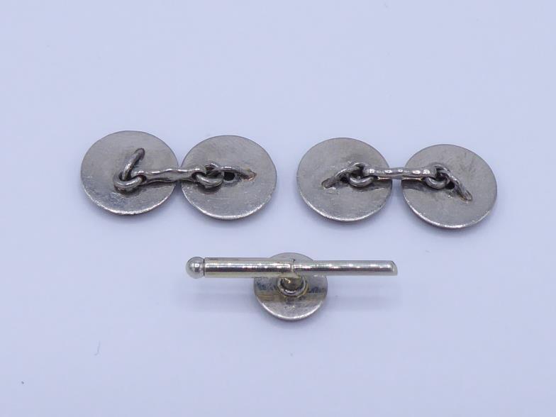 A pair of Art Deco 18 carat white gold and enamel cuff links by Henri Droguet, each plain polished - Image 3 of 3