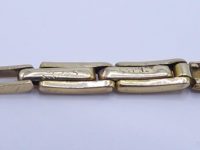 A 1940s citrine set yellow metal (tests 9 carat gold) bracelet, the central collet set oval cut - Image 3 of 3