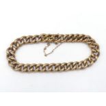 A 9 carat gold curb link bracelet, each link stamped '9c', 18 cm long, 11.8gms CONDITION: good, with