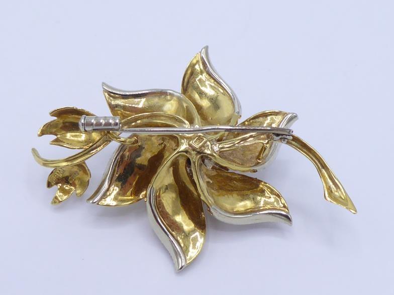 A ruby and diamond spray brooch, modelled as a single flower, a cluster of small round cuts to the - Image 2 of 5