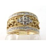 A 9 carat gold and diamond band ring, with a central ornamental band set with a cluster of single