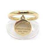 TIFFANY & Co, an 18 carat yellow gold ring, with heart tag, signed and fully hallmarked, finger size