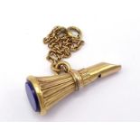 A 19th century gold and lapis lazuli fob seal/dog whistle, the uncut circular lapis seal 11mm