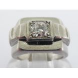 A French Art Deco platinum and single stone diamond ring, the central box set old brilliant cut