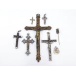 Six various crucifixes, one with hidden compartment, one with micromosaic, together with a St