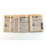 Fourteen daily papers from WWII covering critical points of the war, such as Dunkirk, Malta,