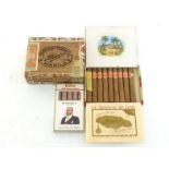 An unopened box of 50 Alhambra Bellezas cigars, a box of 9 La Tropical Diplomat cigars and an