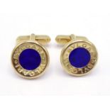 BULGARI, a pair of 18 carat gold and lapis lazuli cufflinks by BVLGARI, the circular links with an