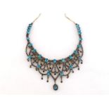 An Indian diamond and topaz necklace, the scooped fringe composed of pave set fleur-de-lis and