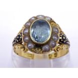 An early Victorian 18 carat gold, aquamarine, split pearl and enamel mourning ring, the central oval