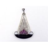 An Art Deco diamond, ruby, onyx and seed pearl pendant, designed as a rising flame of calibre cut