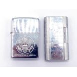 Two stainless steel Zippo lighters