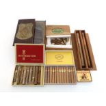 A counter display box of over 60 cigars under a glass cover, the box labelled " A.S.A.R. El Principe