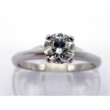 A platinum and single stone diamond ring, the round cut brilliant approx. 0.67 carat, the shank