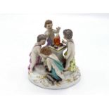 Meissen. A small ceramic group of four putti tending a flame set on a short column, the underside of