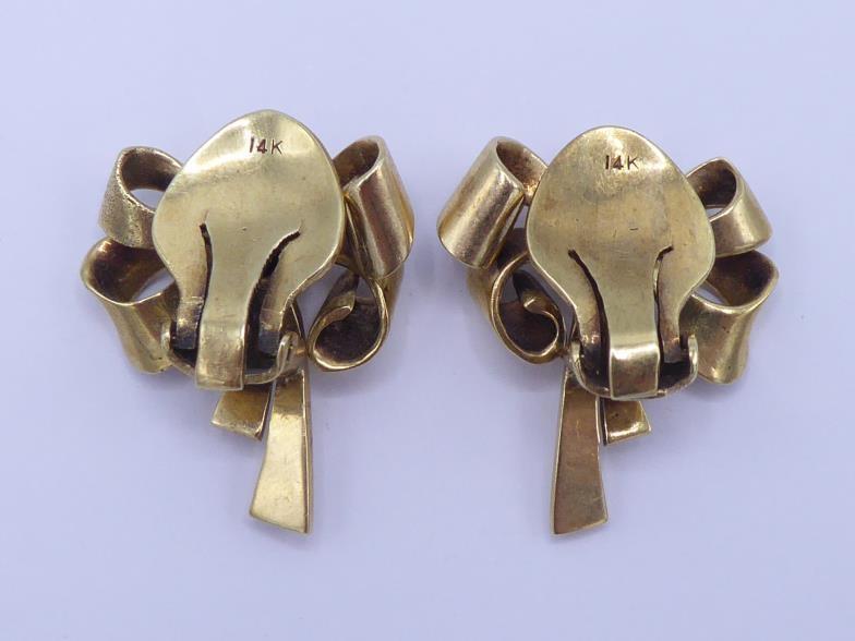 A pair of 1950s diamond ear clips, designed as a bow, three small single cuts to the centre, stamped - Image 2 of 3