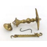 Judaica:-An 18th. century German brass Sabbath lamp complete with long ratchet hook, the ratchet