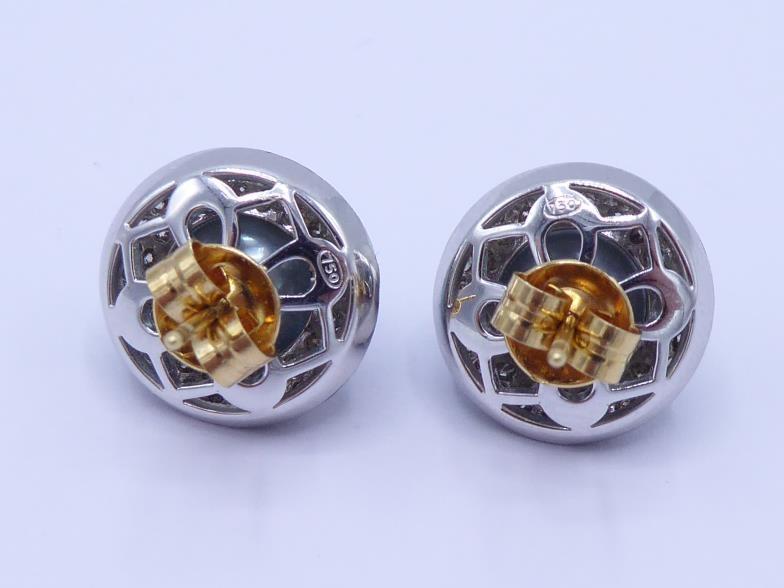 A pair of cultured pearl and diamond ear studs, the grey pearls 8.6mm, in a two row surround of - Image 2 of 3