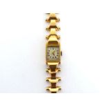 A French Art Deco lady's yellow metal (tests 18 carat gold) manual wind wristwatch, the square