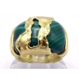 An Italian 18 carat gold and malachite ring, set to the centre with a convex section of malachite,