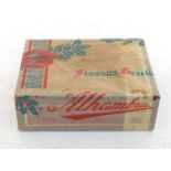 An unopened box of 50 Alhambra Bellizas Matra cigars in original Christmas gift wrapper.