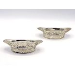 A pair of late Victorian silver sweet dishes of navette form with pierced sides, by Atkin