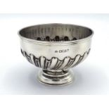 A small late Victorian silver sugar bowl by William Hutton & Sons Ltd., Sheffield, 1898, with