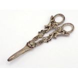 A pair of silver grape scissors, Sheffield, 1971, the handles formed as a fox running along a