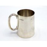 An Edwardian silver christening mug by Martin & Hall, Sheffield, 1901, plain tapering form with "