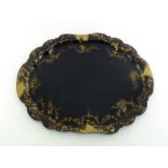 A large Jennens and Bettridge papier mache shaped lobed tray, decorated in gilt falling wisteria