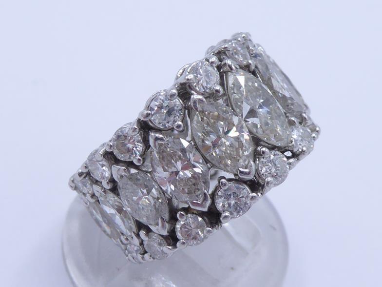 A diamond ring, the central row claw set with graduated marquise cuts totalling approx. 5.91 carats, - Image 4 of 4