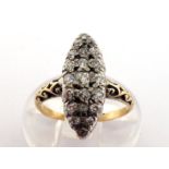 A diamond ring, the marquise type bezel pave set overall with old cut stones, the bezel 18 x 7mm, to