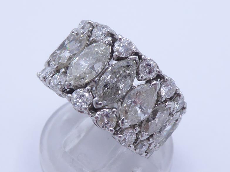 A diamond ring, the central row claw set with graduated marquise cuts totalling approx. 5.91 carats, - Image 3 of 4