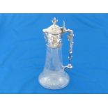 A Victorian claret jug by Elkington & Co., 1879, the etched glass body with electrotype silver-