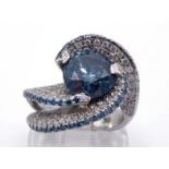 A fancy blue diamond dress ring, the central blue (untested) brilliant cut approx. 2.50 carats,