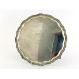 A shaped circular silver salver by Carrs of Sheffield Ltd., Sheffield, 1993, with gadroon rim, on