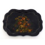 A large Victorian shaped rectangular papier mache tray, the centre hand painted with flowers. In