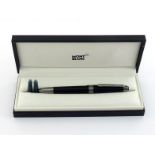 MONTBLANC, Le Grand, an ultra black matt resin fountain pen, with medium nib and cartridge filler,